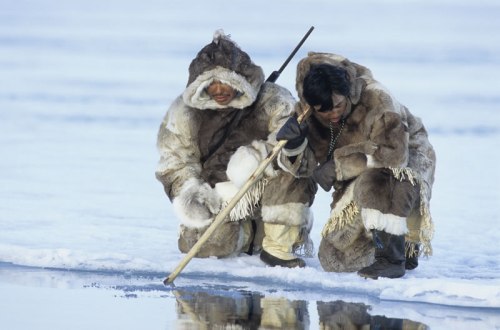 Inuit People Hunting For Fish
